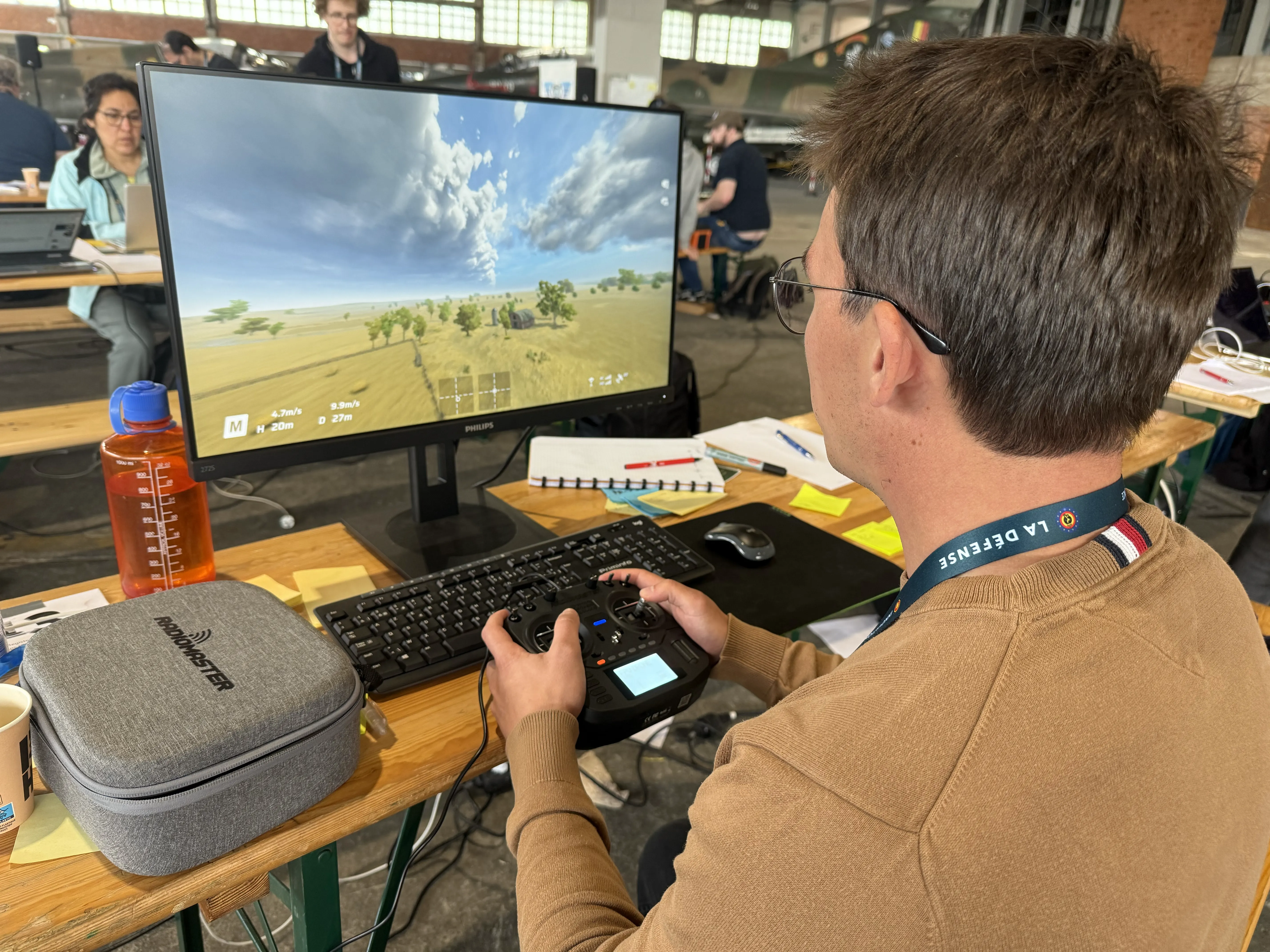 Arthur Louette flying drones at Inno4Def hackathon using Liftoff simulator